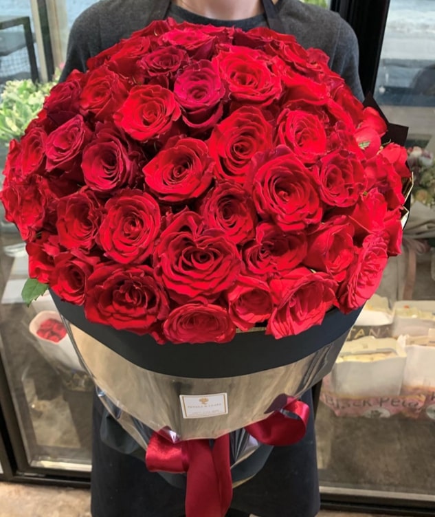 99 open red roses bloom online